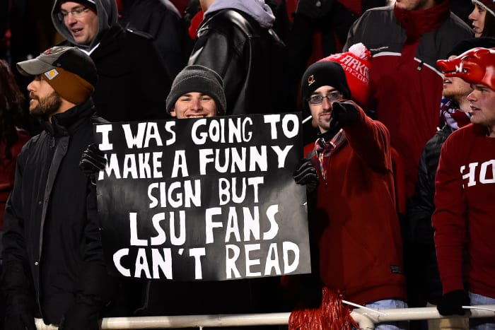 A fan holds up a sign during the second half of the game between the Arkansas Razorbacks and the LSU Tigers at Donald W. Reynolds Razorback Stadium. The Arkansas Razorbacks defeat the LSU Tigers 17-0.